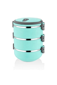 A mint green stackable lunch box with three tiers and a dark gray lid, set on a marble countertop