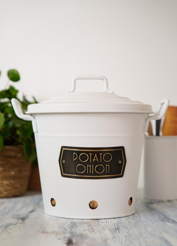 White galvanised steel potato and onion storage bin with a lid and handles, featuring a label with 'Potato O'Horo' branding.