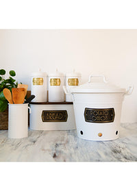 White galvanised steel potato and onion storage bin with a lid and handles, featuring a label with 'Potato O'Horo' branding.