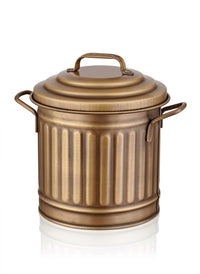 A gold-colored galvanised steel countertop waste basket with a lid and handles, featuring a rustic design.